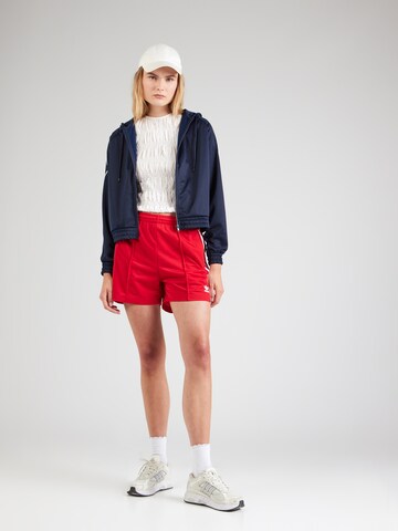 ADIDAS ORIGINALSLoosefit Hlače 'Firebird' - crvena boja
