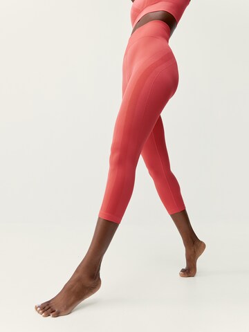 Born Living Yoga Skinny Workout Pants 'Nish' in Orange: front