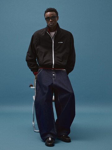 BershkaPrijelazna jakna - crna boja