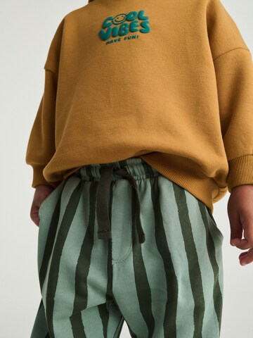 Next Joggingpak in Bruin