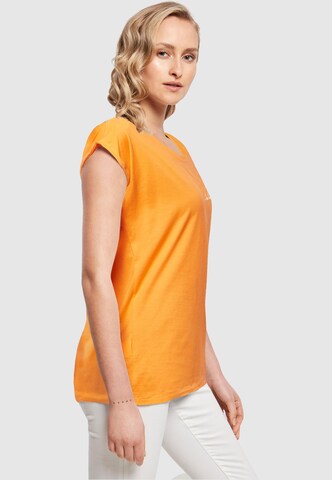 Merchcode T-Shirt 'Be Happy' in Orange