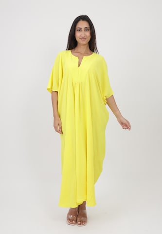 Elara Kjole i gul: forside