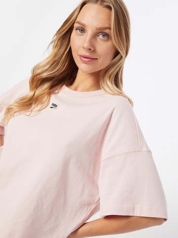 PUMA Functioneel shirt 'PUMAxABOUT YOU' in Roze