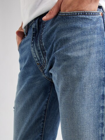 LEVI'S ® Tapered Jeans '512™' i blå