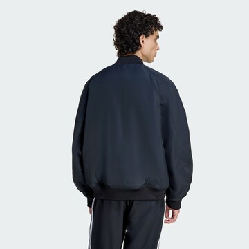 ADIDAS ORIGINALS Sportjacke 'Teamgeist' in Schwarz