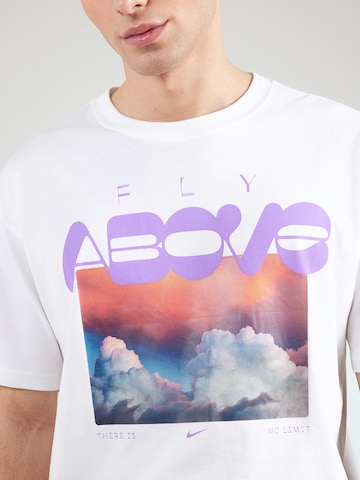 T-Shirt 'ABOVE' Nike Sportswear en blanc
