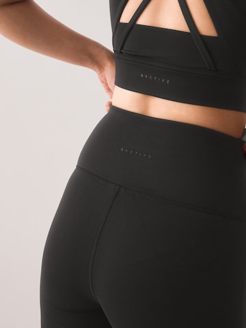 Skinny Pantalon de sport 'Active Balance' Next en noir