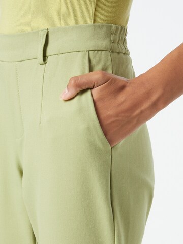 OBJECT Zwężany krój Spodnie 'LISA' w kolorze zielony