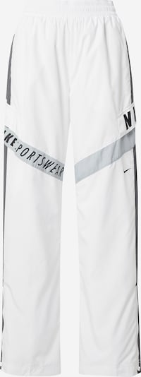 Laisvo stiliaus kelnės iš Nike Sportswear, spalva – juoda / balta, Prekių apžvalga