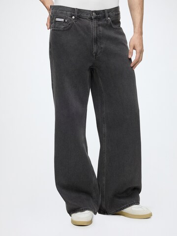 Calvin Klein Jeans Wide leg Jeans 'ESSNTL' i svart: framsida