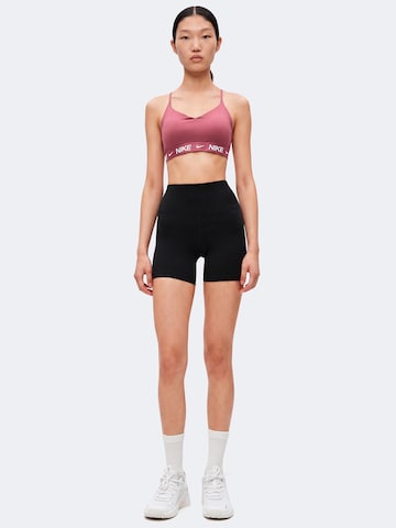 NIKE Bygelfri Sportbehå 'INDY' i rosa