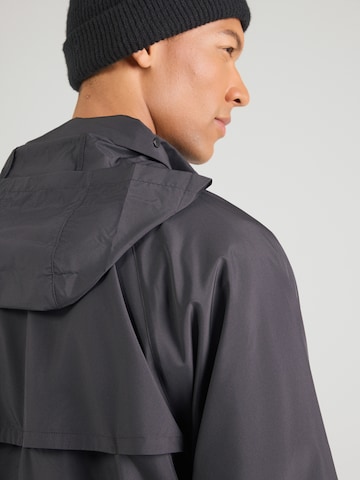 Nike Sportswear Átmeneti dzseki 'WR' - fekete