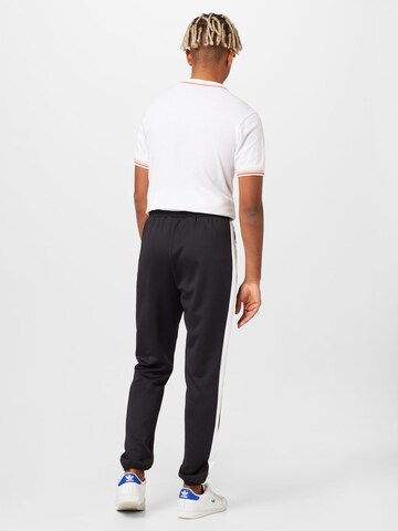 ELLESSE Zúžený Sportovní kalhoty 'Foxio' – černá