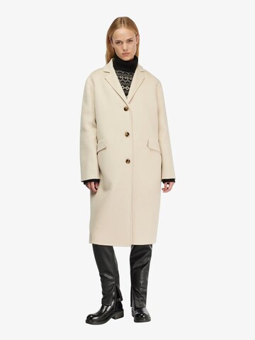 Manteau mi-saison Semicouture en beige : devant