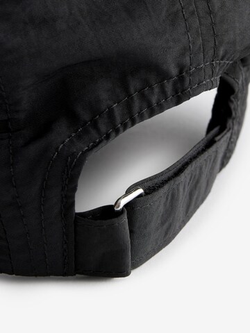 Casquette Next en noir