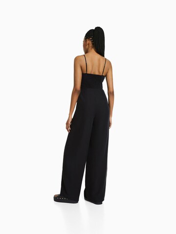 Tuta jumpsuit di Bershka in nero