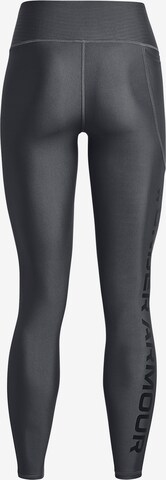 Skinny Pantaloni sportivi di UNDER ARMOUR in grigio