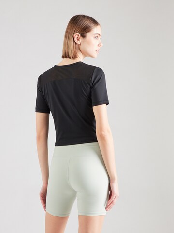 Champion Authentic Athletic Apparel - Camiseta funcional en negro