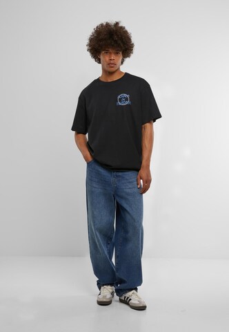 Maglietta 'The World Is Ours' di Mister Tee in nero