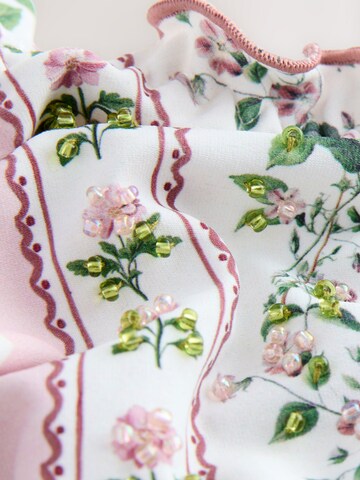 Next Kolmio Bikinitoppi värissä beige