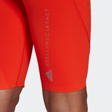 Skinny Pantalon de sport ADIDAS BY STELLA MCCARTNEY en orange