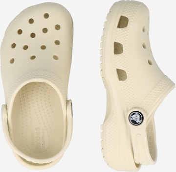 Calzatura aperta di Crocs in beige