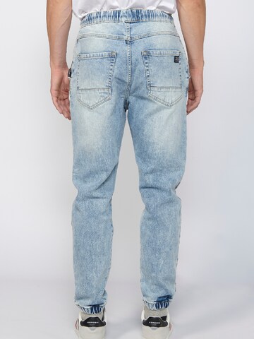 KOROSHI Tapered Jeans in Blau