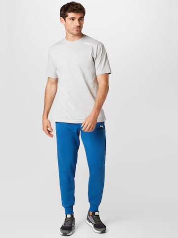 Tapered Pantaloni sport de la PUMA pe albastru