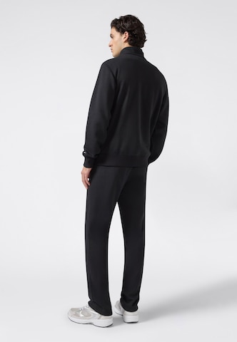 Champion Authentic Athletic Apparel Sweatsuit in Black