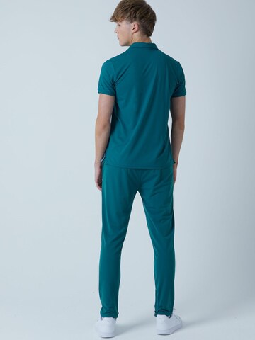 T-Shirt fonctionnel 'Polo' SPORTKIND en vert