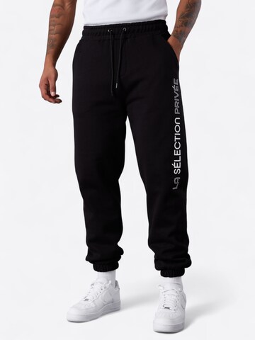 ESTEEM Tapered Trousers 'Sélection Privée' in Black: front