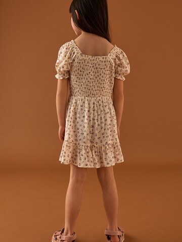 Tuta di Next in beige