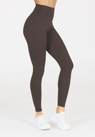 Athlecia Skinny Sportbroek 'FRANZ' in Bruin
