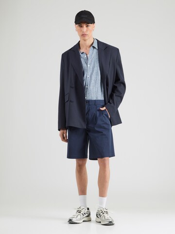 Calvin Klein Jeans Свободный крой Брюки со складками в Синий