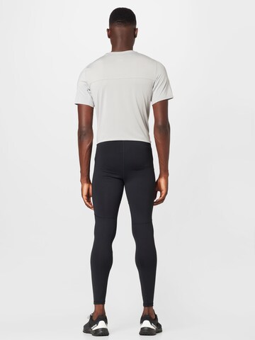 Reebok Skinny Sports trousers in Black