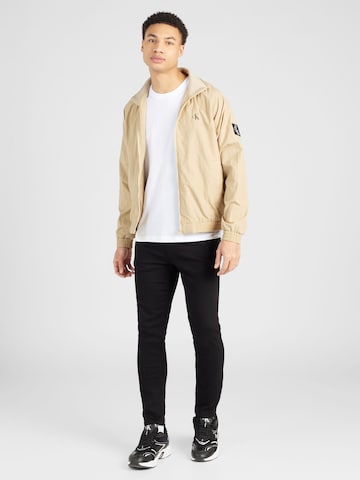 Calvin Klein Jeans Štandardný strih Prechodná bunda 'HARRINGTON' - Béžová
