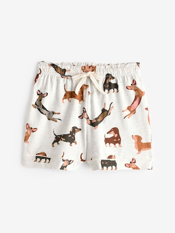 Pijama de la Next pe bej