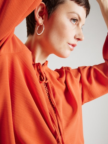 ABOUT YOU Blouse in Orange