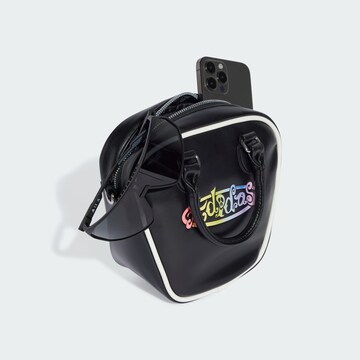 Sacs à main 'adidas x Jeremy Scott Pride Mini' ADIDAS ORIGINALS en noir
