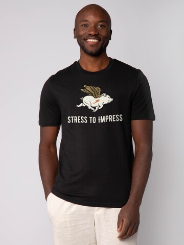 T-Shirt 'Stress To Impress' Watapparel en noir : devant