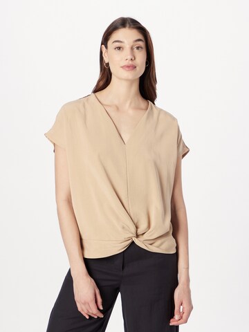 Summum Blus i beige: framsida