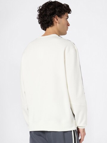 Champion Authentic Athletic Apparel Sweatshirt i hvid