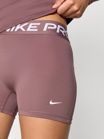 NIKE Skinny Workout Pants '365' in Purple