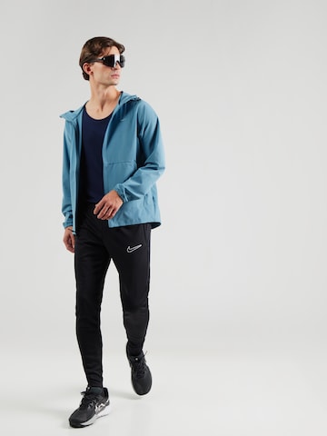 NIKE Спортивная куртка 'UNLIMITED' в Синий