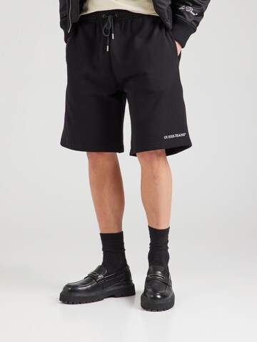 GUESS JEANS Loose fit Trousers in Black: front