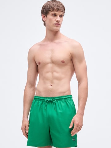Calvin Klein Swimwear Hlače za k noši | zelena barva