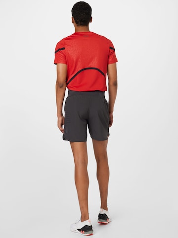 UNDER ARMOURregular Sportske hlače 'SpeedPocket' - siva boja