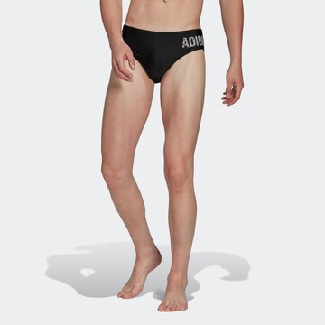 ADIDAS PERFORMANCE Athletic Swim Trunks in Black: front