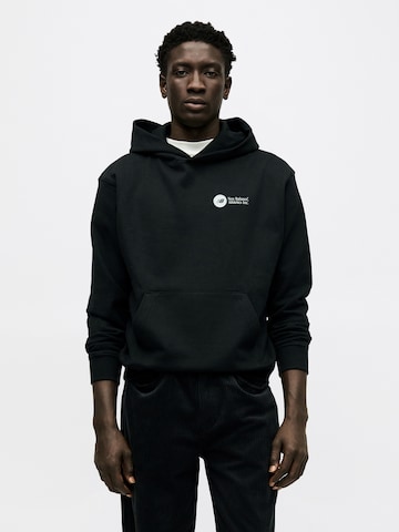 new balance Sweatshirt 'MT61M4JO' i svart: framsida