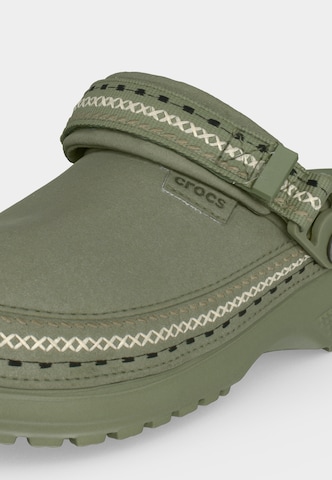Clogs di Crocs in verde